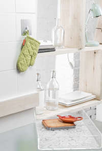 Gancho cromado reposicionable